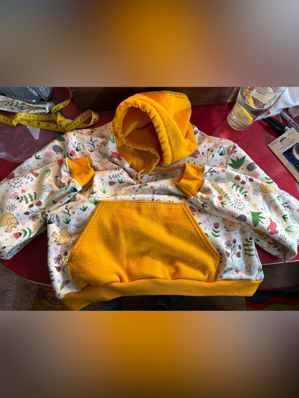 Cozy Yellow Hooded Womans Pullover with Woodland Print